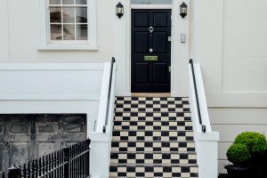 checkered steps leading to entry door