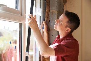 guy installing new window