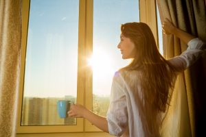 lady looking out window